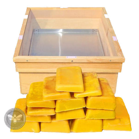 Dancing Bee solar wax melter box for rendering beeswax cappings using sunlight.