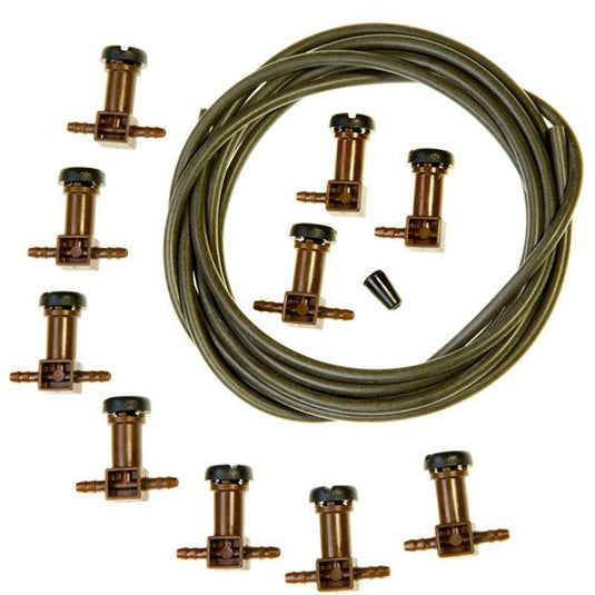 Blumat distribution drippers arranged beside a coil of drip tubing