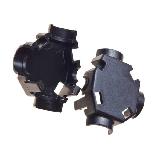 Close-up of two black Blumat hose security clamp bodies