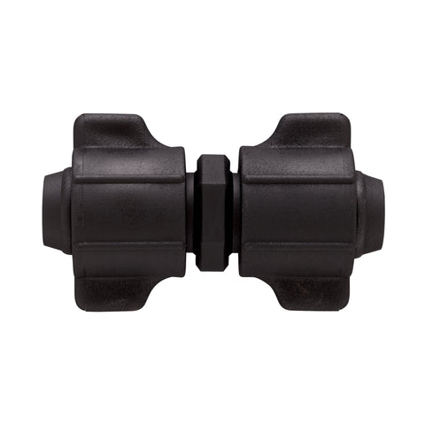 Half-inch universal drip irrigation coupling for distribution tubing.