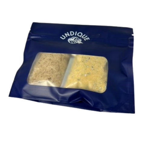 Bag of freeze-dried whole quail egg and quail meat crumble topper.