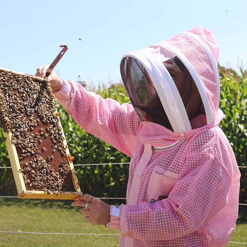 Pink vented beekeeping suit made of poly-cotton mesh fabric.