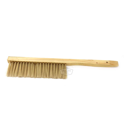 Bee brush with long soft bristles for gently clearing bees from hive frames.