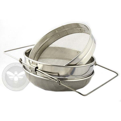 Two-stage stainless steel double filter sieve for straining honey impurities.