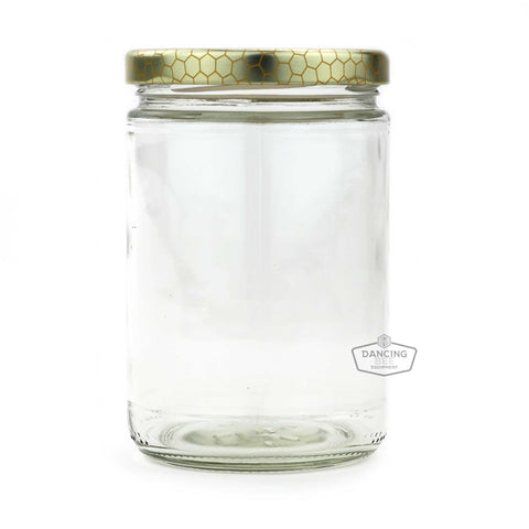 Glass cylinder honey jar with honeycomb-print lid, 350 ml capacity.