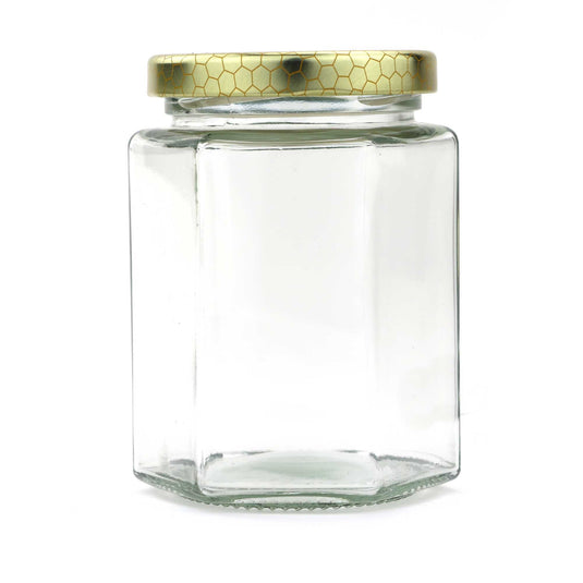 Glass hexagon honey jar with lid, 380 ml / 540 g capacity.