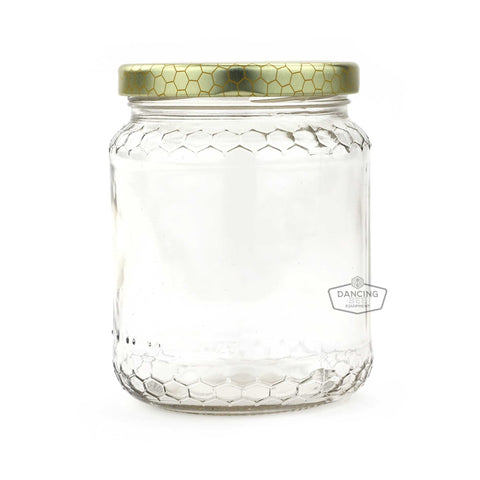 Glass honey jar with embossed honeycomb pattern and matching lid, 500 g.