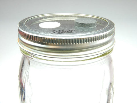 Air filter vent, adhesive backing detail