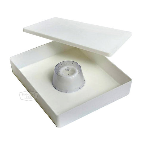 Ridged plastic internal hive top feeder for feeding sugar water.