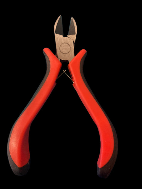 Precision wire cutter hand tool for trimming frame wire and wax foundation.