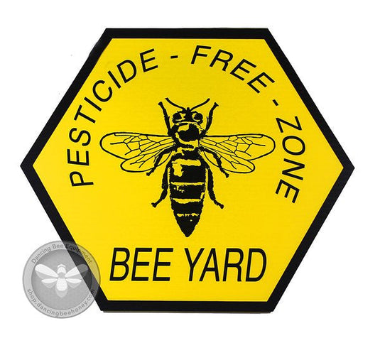 Pesticide-free bee yard sign warning neighbors to avoid spraying near hives.
