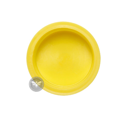 Round two-inch plastic plug for sealing an inner cover entrance hole.