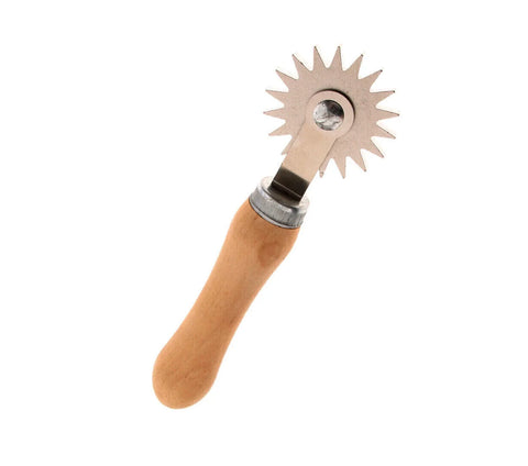 Wire spur embedding tool for rolling wire into beeswax foundation on frames.