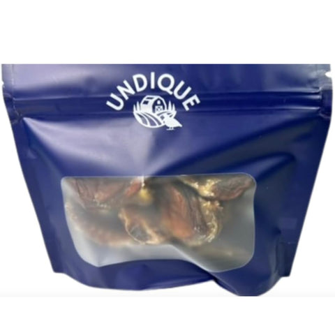 Bag of dehydrated quail spine and leg crunch sticks for dogs.