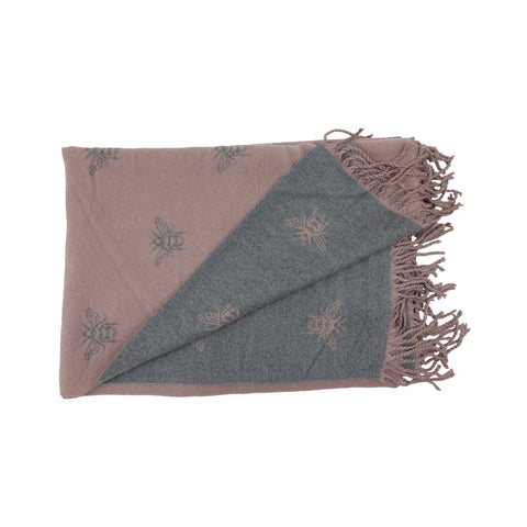 Double-sided scarf with bee print pattern on both reversible sides.