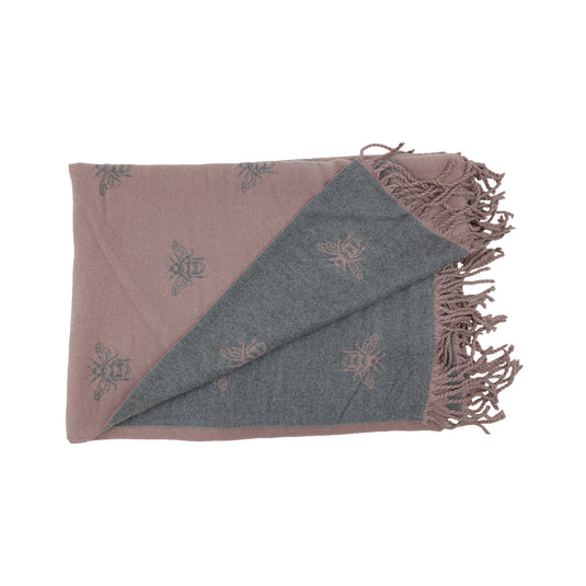 Double-sided scarf with bee print pattern on both reversible sides.