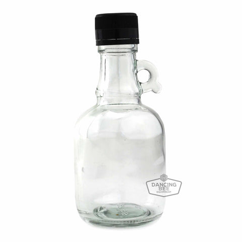 Glass gallon-jug-style maple syrup bottle with handle, 250 ml capacity.