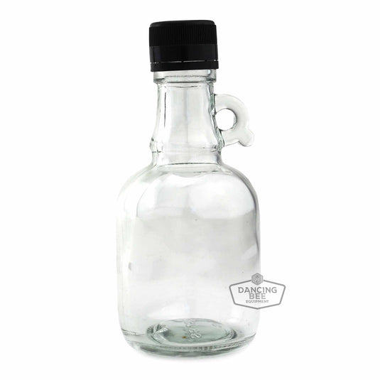 Glass gallon-jug-style maple syrup bottle with handle, 250 ml capacity.