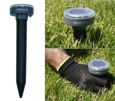 Solar-powered ultrasonic rodent repeller stake for burrowing pests.