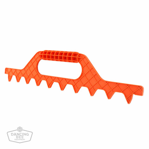 Orange plastic 9-frame spacing tool for spacing frames in a 10-frame super.