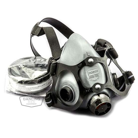 Half-face respirator mask with soft elastomer face piece for beekeeping.